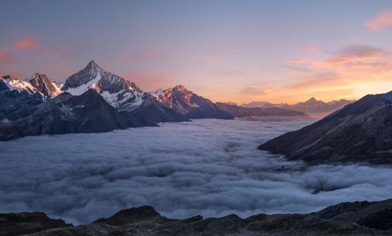 Person meditating at sunrise with calm morning light